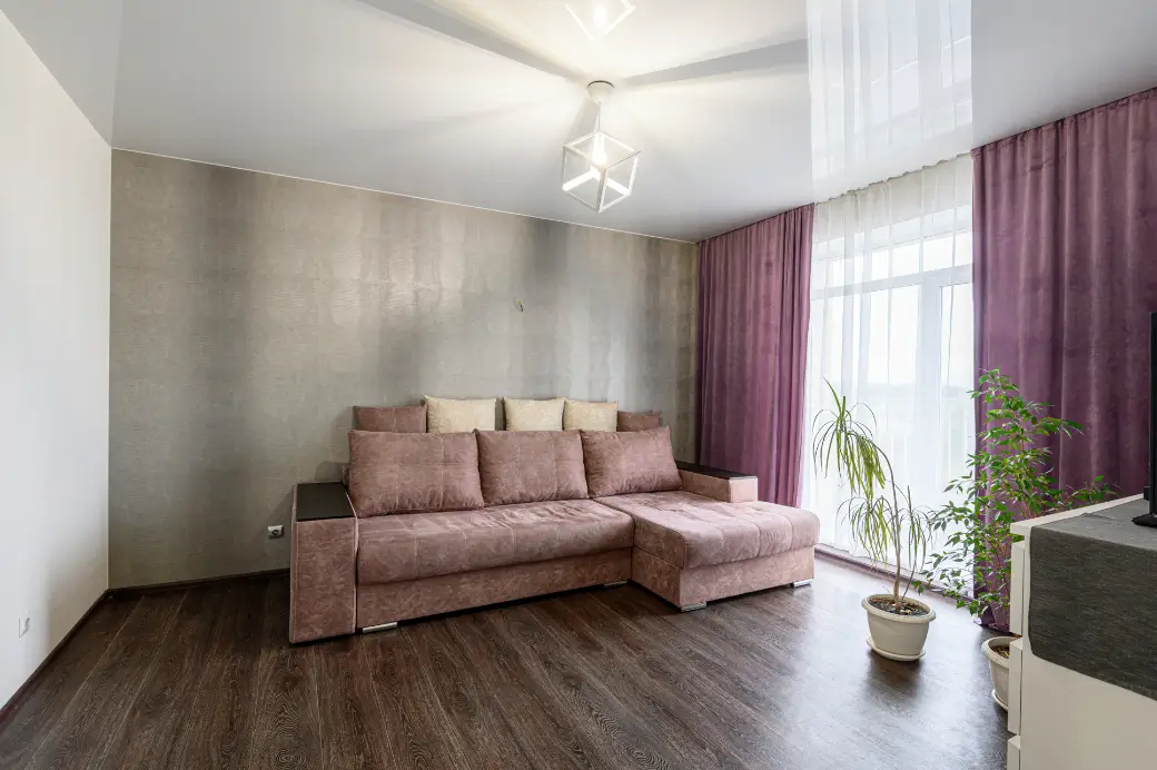 Modern living room with purple curtains