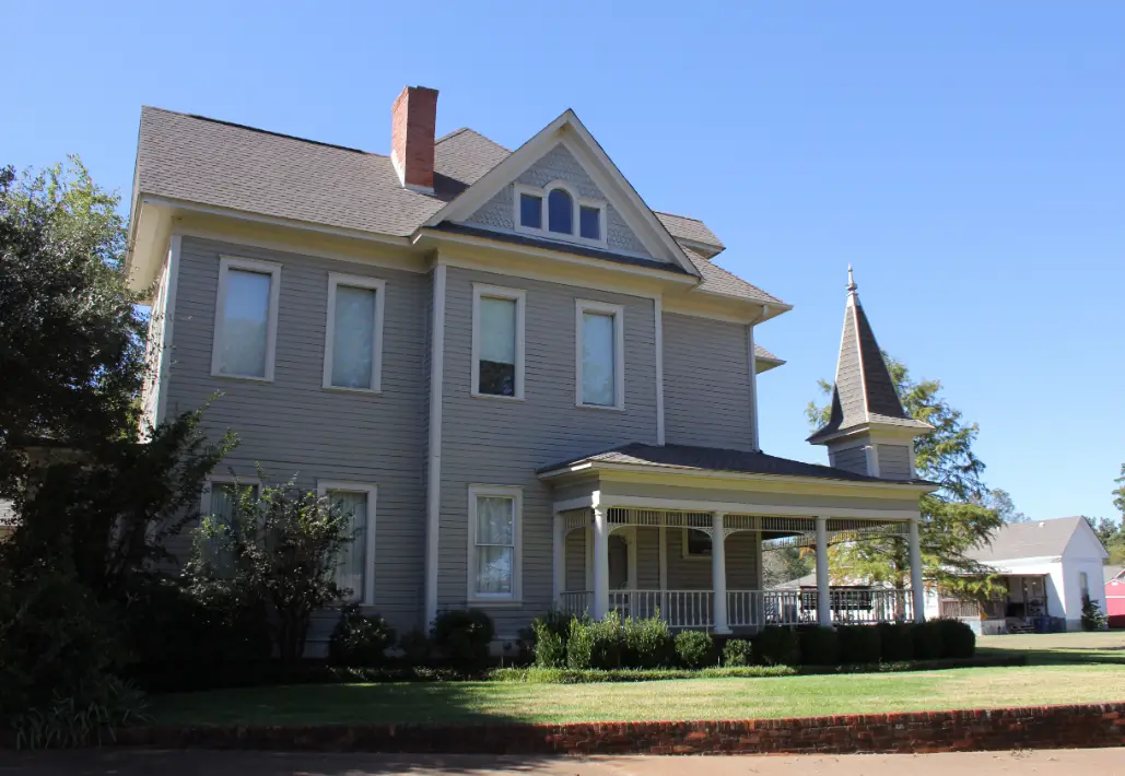 Victorian-style house with porch